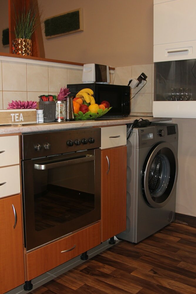 Фото Gold Downtown Apartman