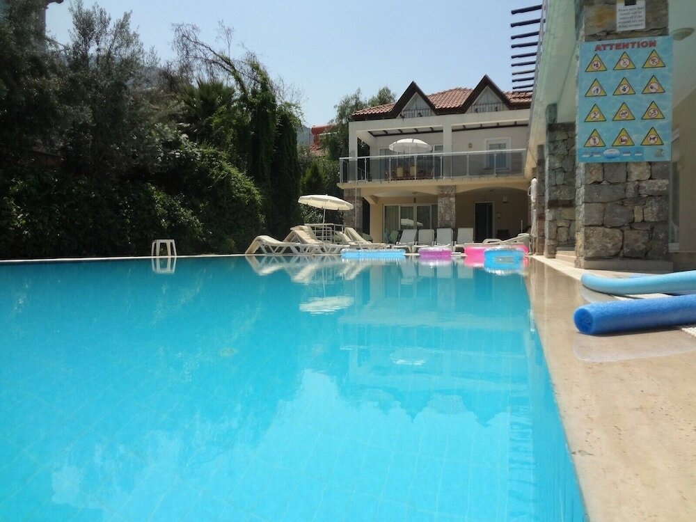 Фото Number 8, Olivia Apartments