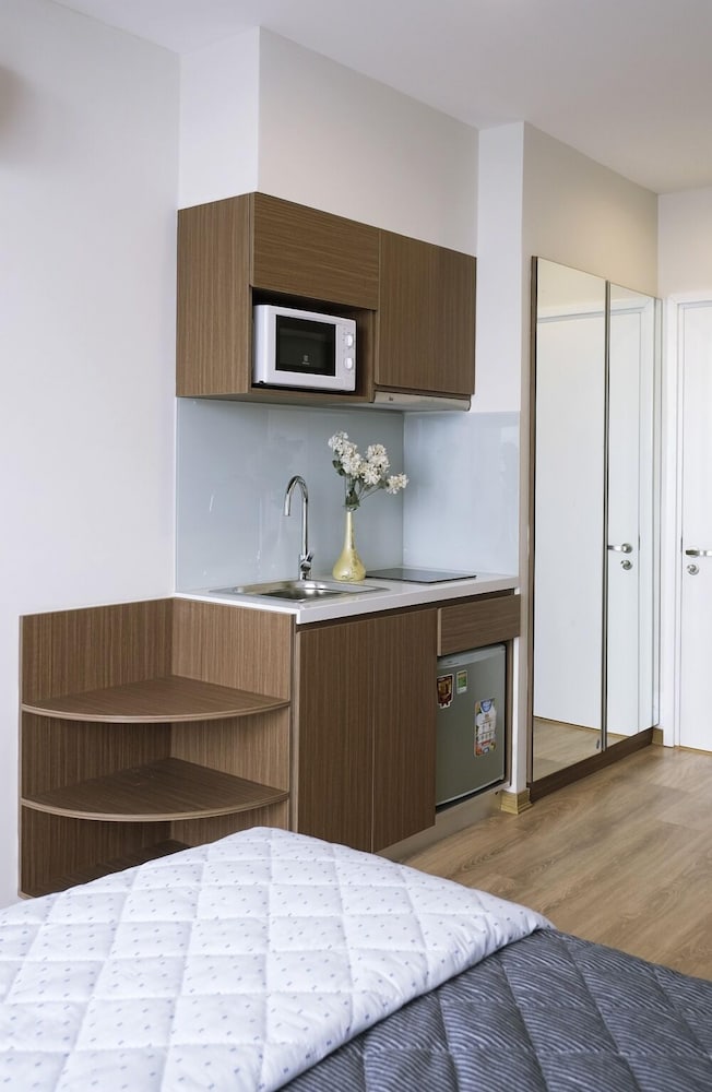 Фото Lotus Inn Serviced Apartment