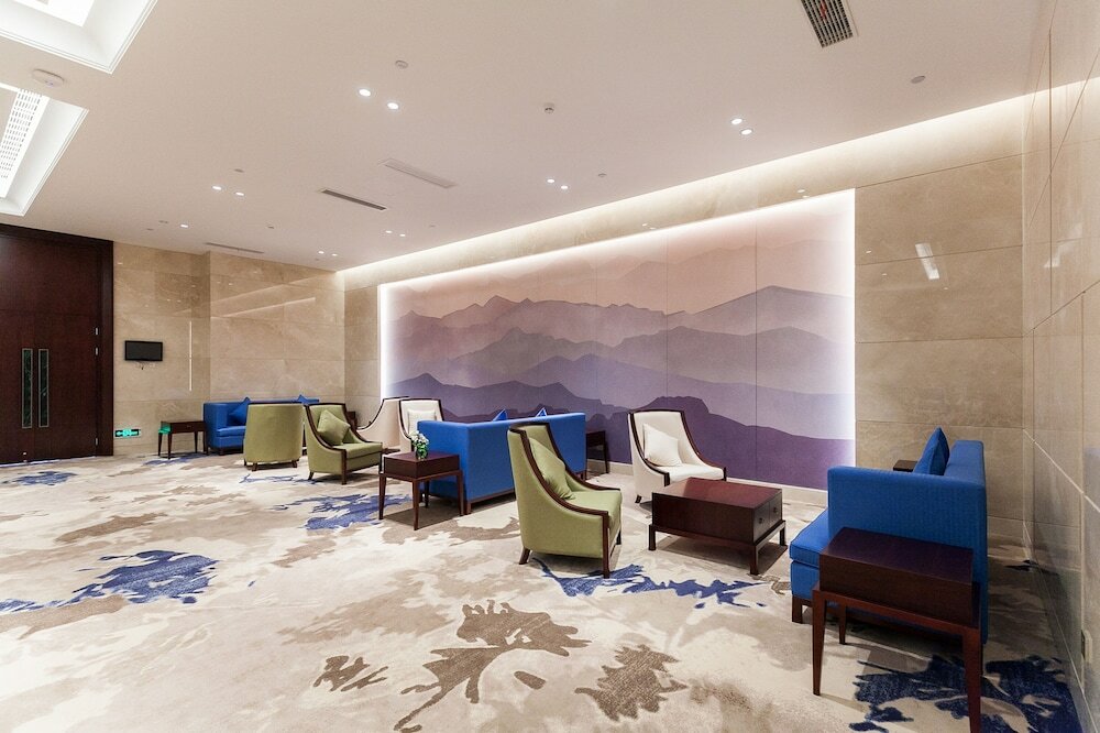 Фото Jinyi Jinglan Hotel