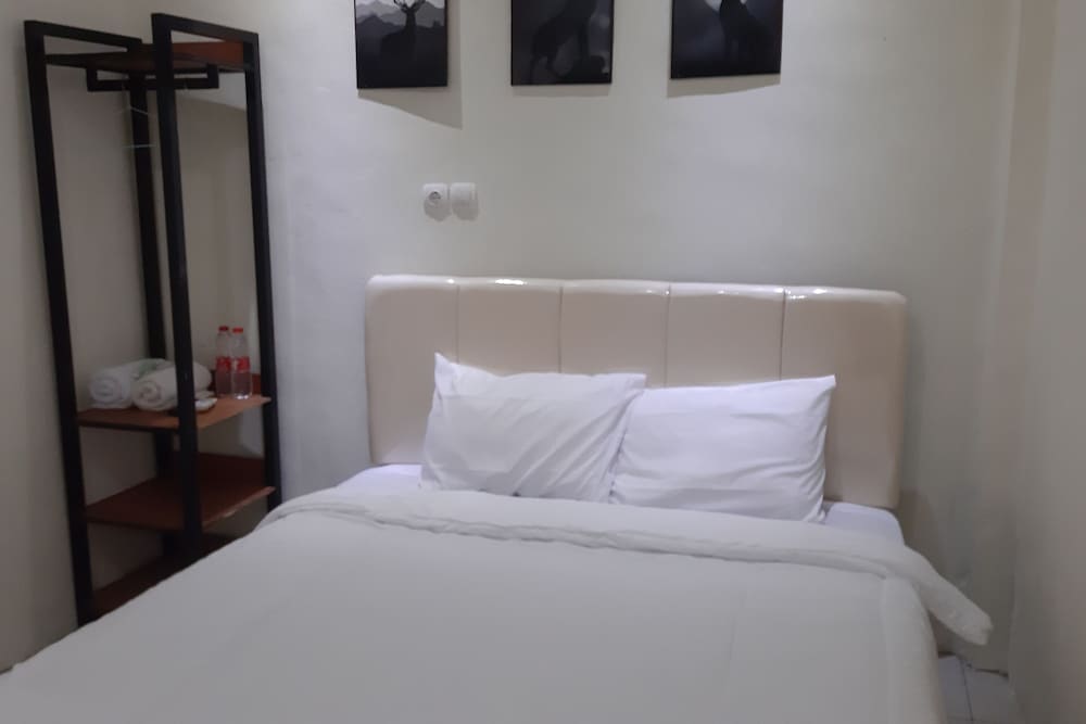 Фото Oyo 90299 Corner Guest House