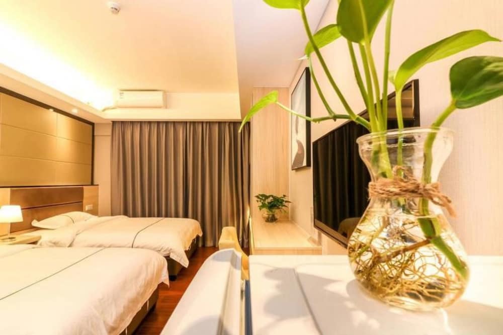 Фото BaiHe International Apartment Hotel