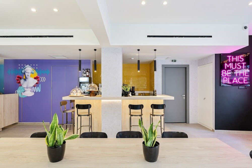 Фото The Q Hotel