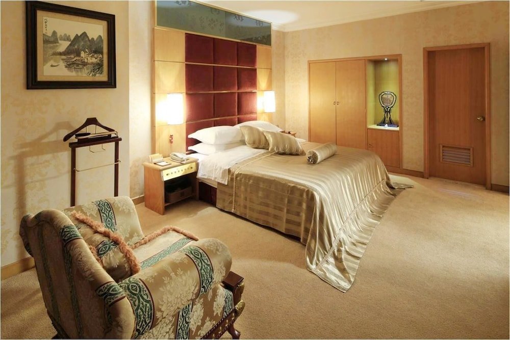 Фото Economic Trade Hotel