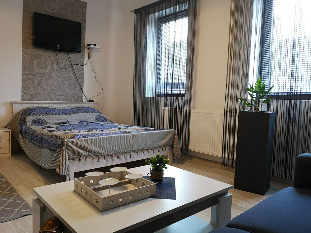 Фото Á-b Apartman