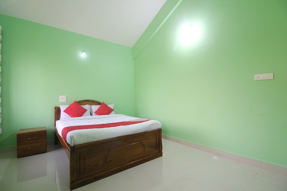 Фото Oyo 39345 Chrisander's Resort