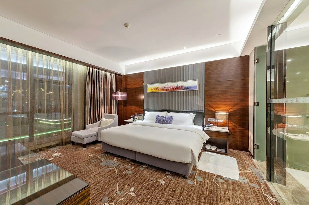 Фото Tianyuan Junlong Hotel