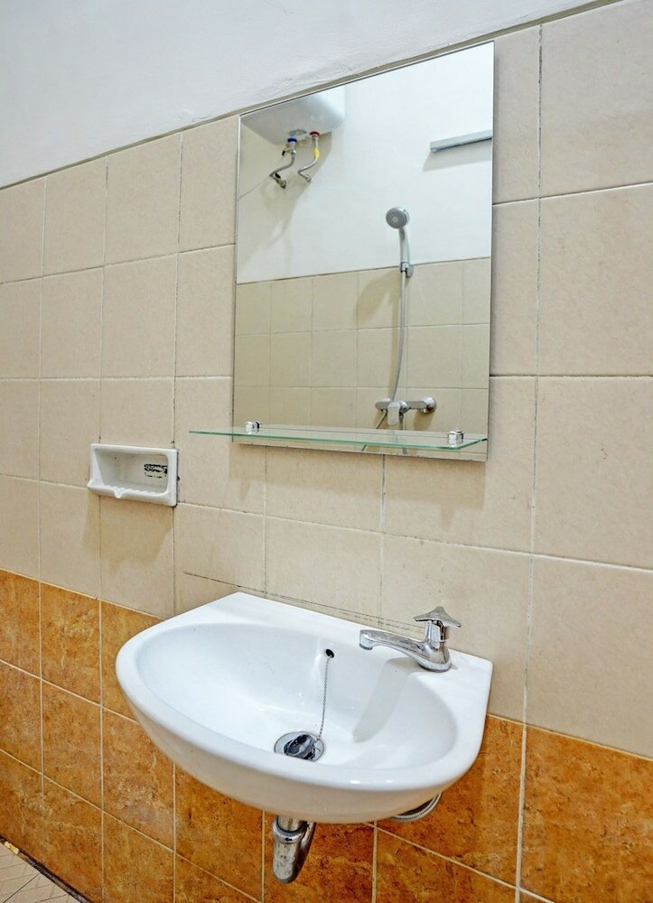 Фото OYO 92435 Sunlo Cozy Home Family Homestay Syariah