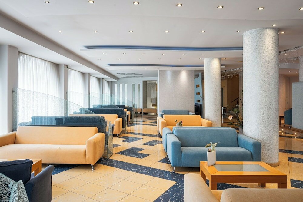 Фото Kreoli Suites Glyfada