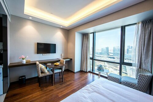 Гостиница Yousu Hotel&Apt Jinji Lake Suzhou в Сучжоу