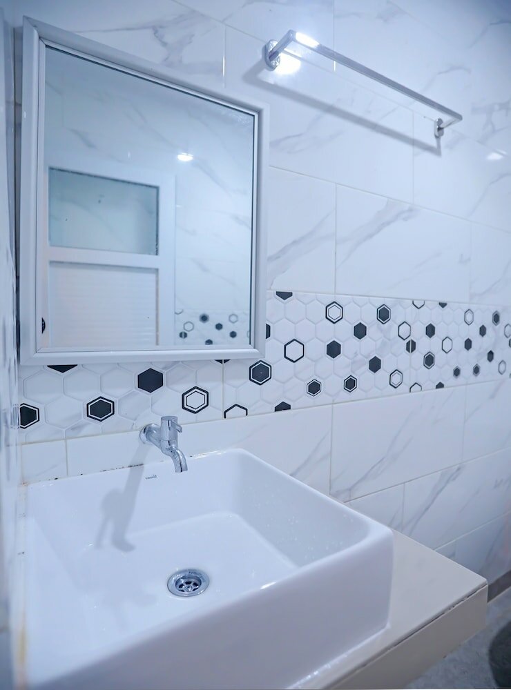 Фото Super Oyo Capital O 92096 Kuala Ulee Lheue Residence Syariah