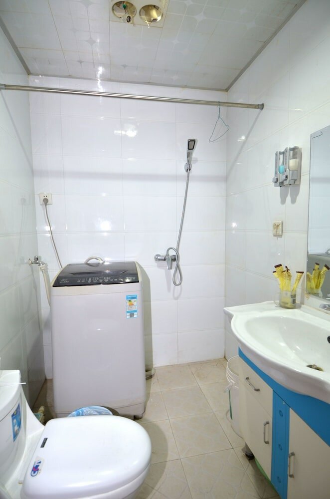 Фото Lanzhou Longshang Mingzhu Apartment Three-bedroom suite