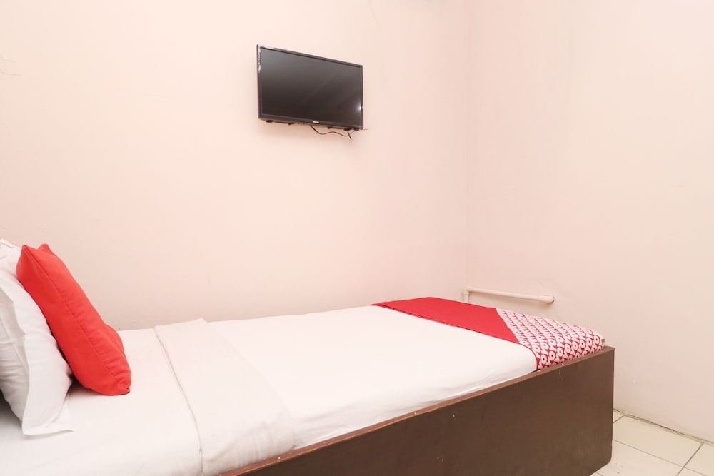 Фото Oyo 30274 Temple City Guest House