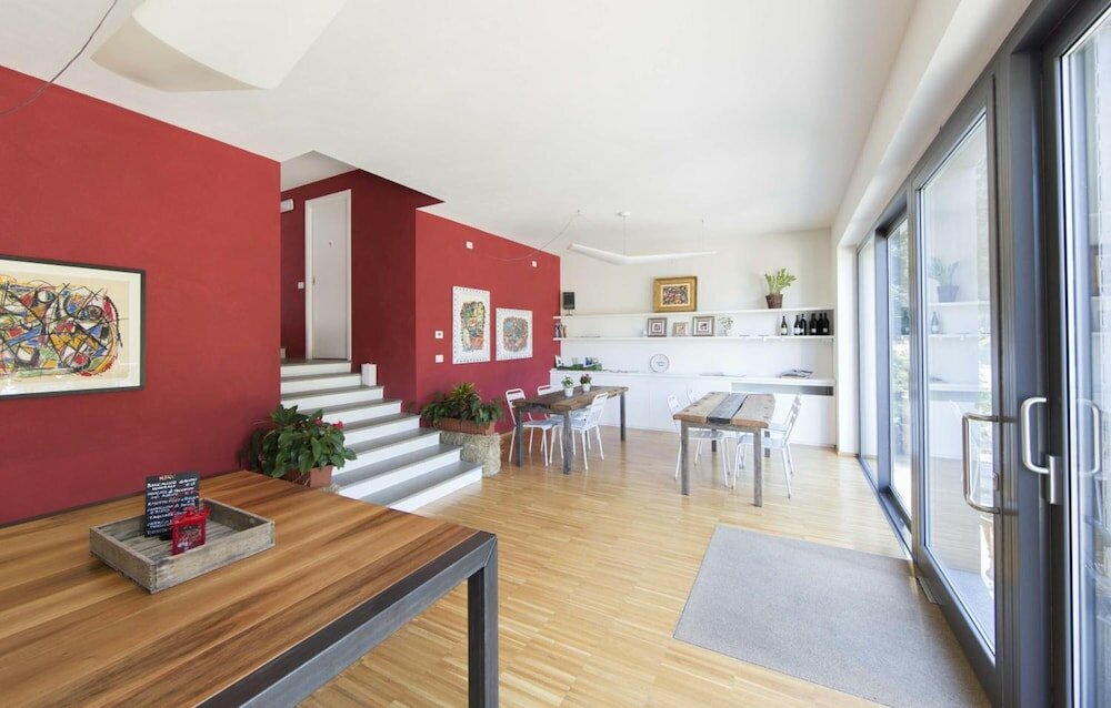 Фото Agriturismo Rossolampone