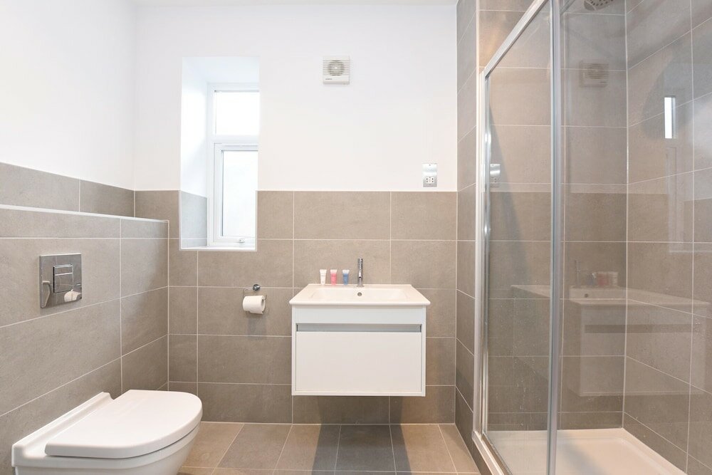 Фото The Glasshouse Apartments