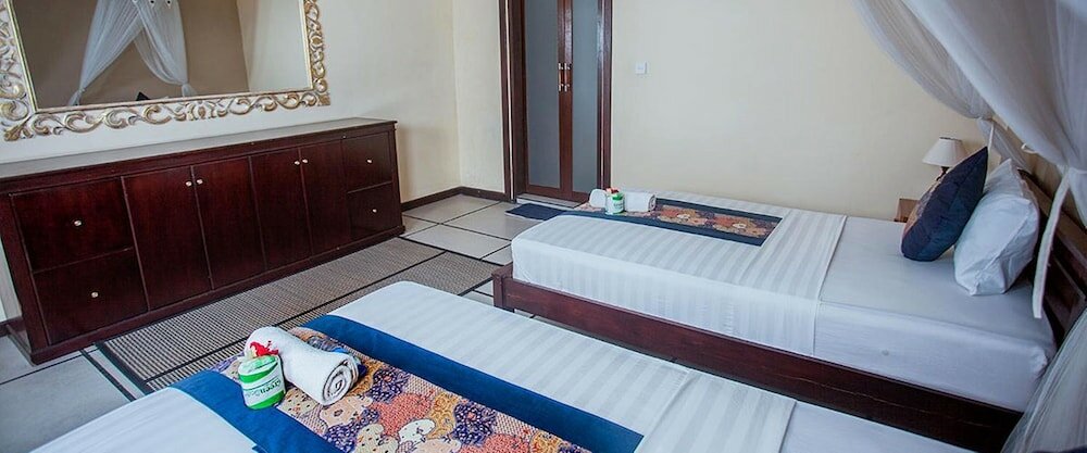 Фото Pondok Kutuh Guesthouse