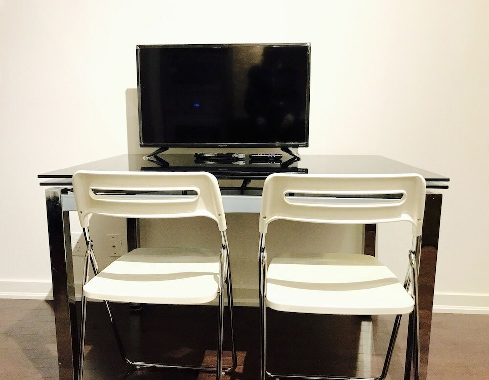 Фото Modern Skyscraper Studio by Cn Tower