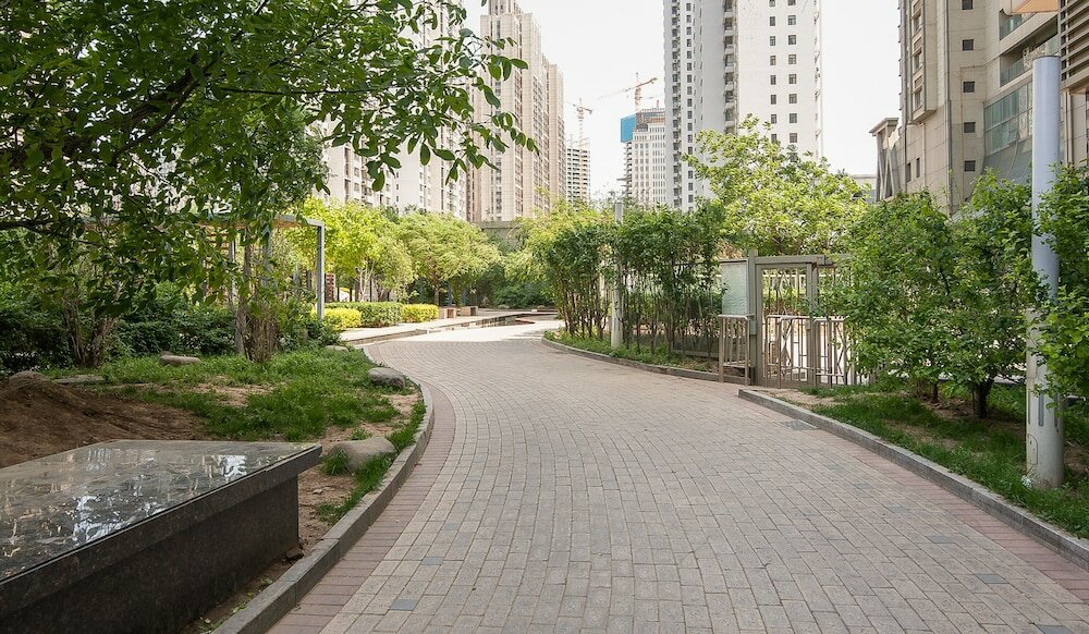 Фото Tianjin Xinyi Apartment Hotel