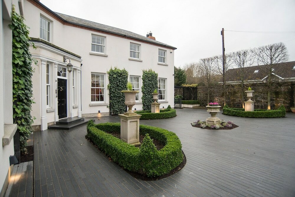 Фото Coach House Boutique B&b