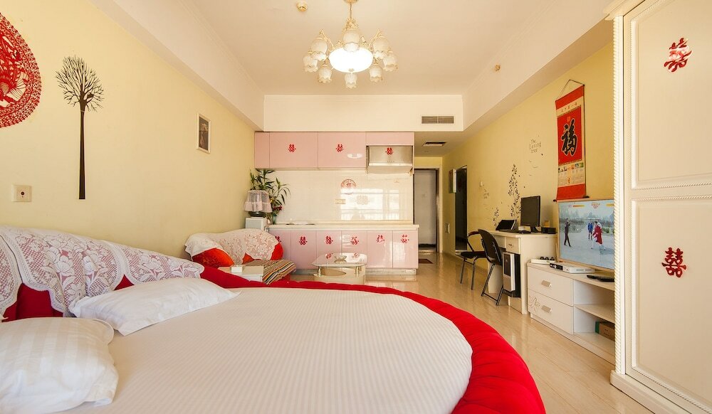 Фото Tianjin Xinyi Apartment Hotel