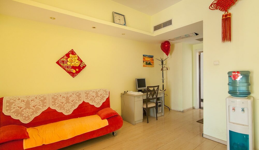 Фото Tianjin Xinyi Apartment Hotel