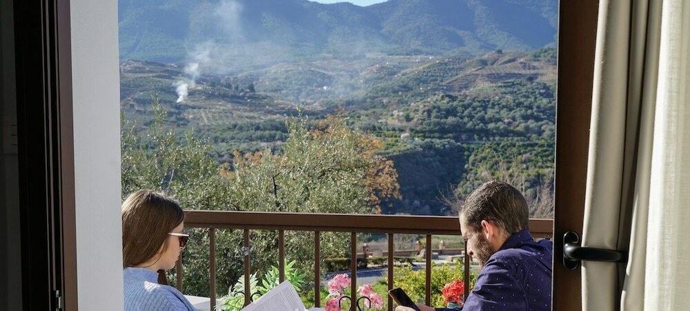 Фото Hostal y Apartamento Rural Los Naranjos