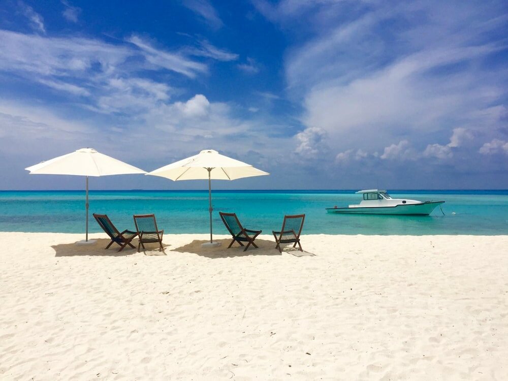 Фото Luau Beach Inn