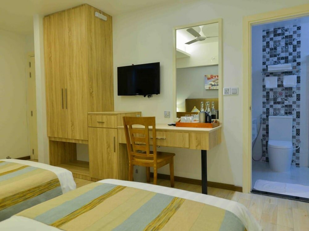 Фото Coconut Tree Hulhuvilla Beach