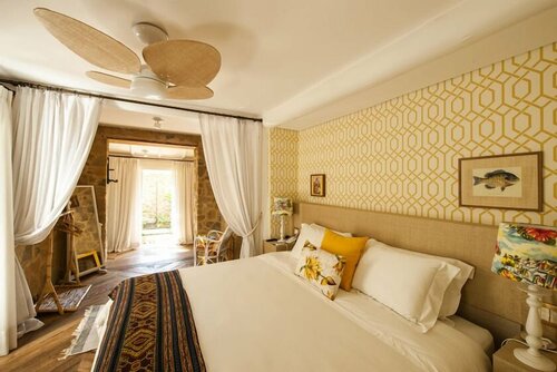 Гостиница Tw Guaimbê Exclusive Suites в Ильябеле