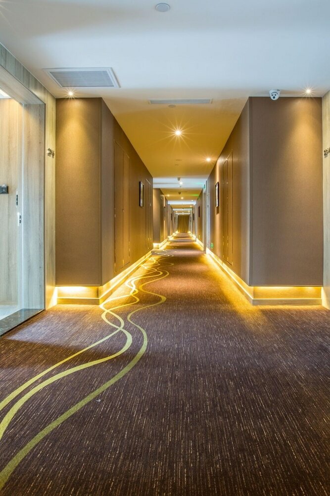 Фото Shenzhen U- Home Apartment Binhe Times