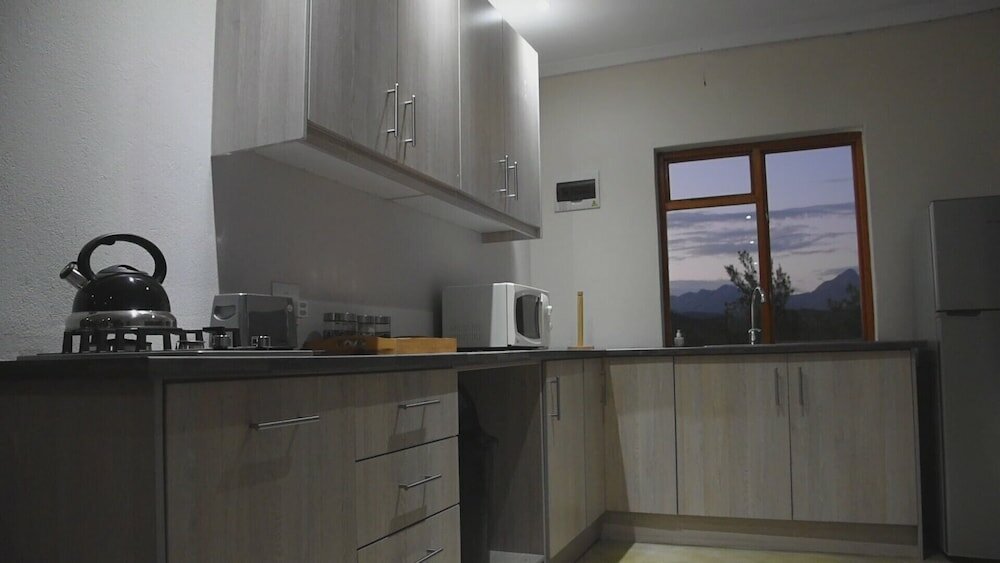 Фото Zwartberg View Mountain Lodge