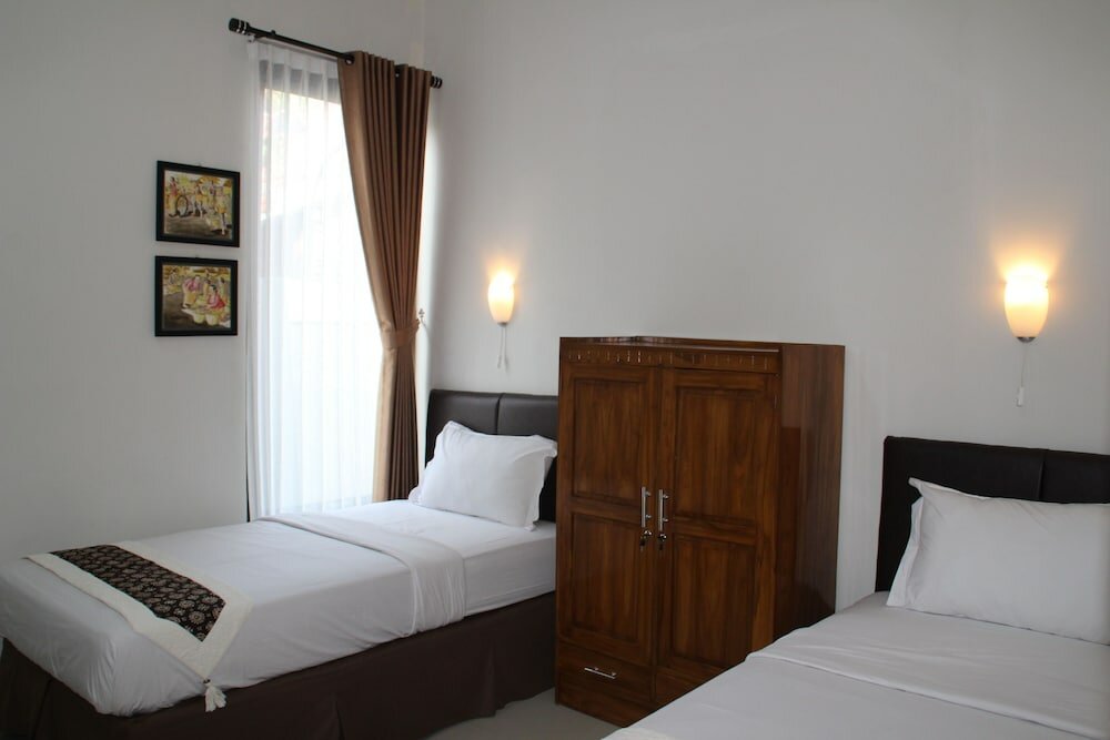 Фото Natura Rumah Singgah Guest House