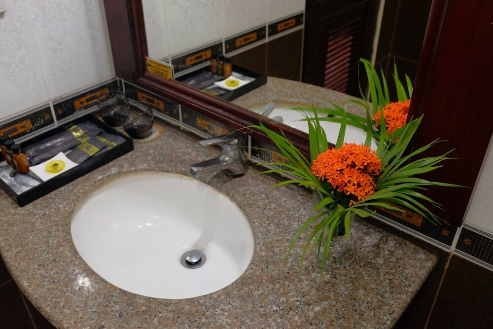 Фото E-Outfitting Vang Thong Hotel