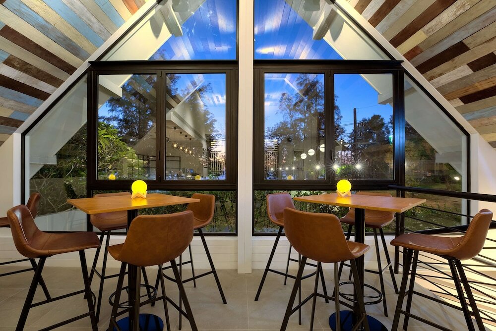 Фото Outrigger Surin Beach Resort