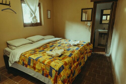 Гостиница Rossco Backpackers Hostel в Сан-Кристобаль-де-лас-Касасе