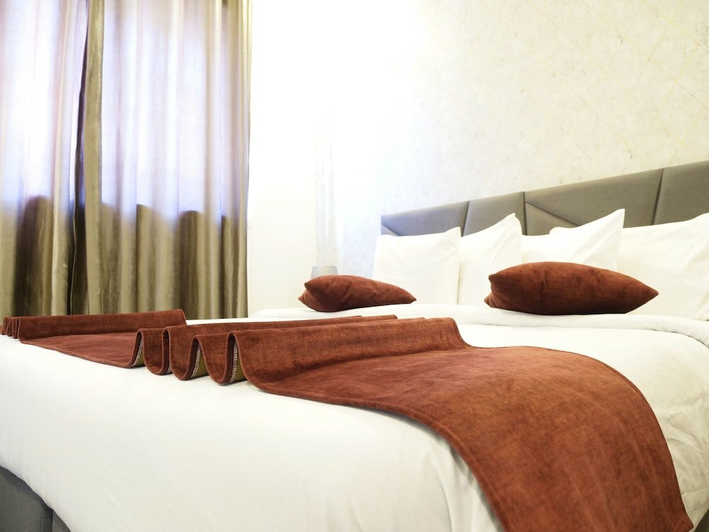 Фото Twins Downtown Hotel