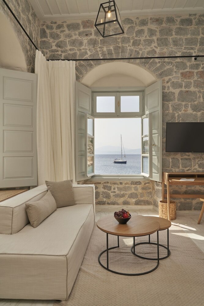 Фото Mandraki Beach Resort - Adults Only