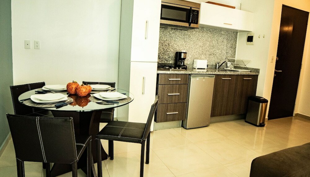 Фото Tiny Apartment with Rooftop pool y Gym