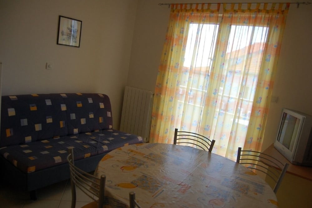 Фото Marti - Free Parking and Grill - A3 - Sunce