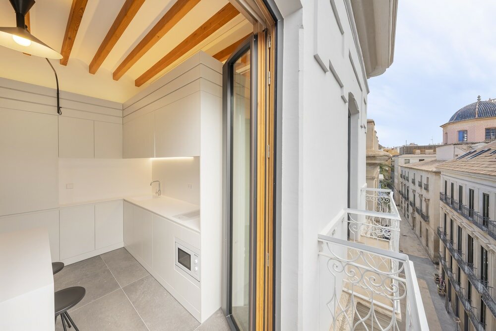 Фото Tandem Portico Alicante Suites