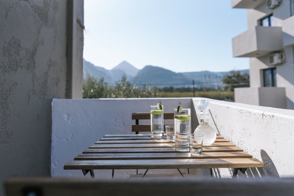 Фото Ermis Luxury Suites & Apartments