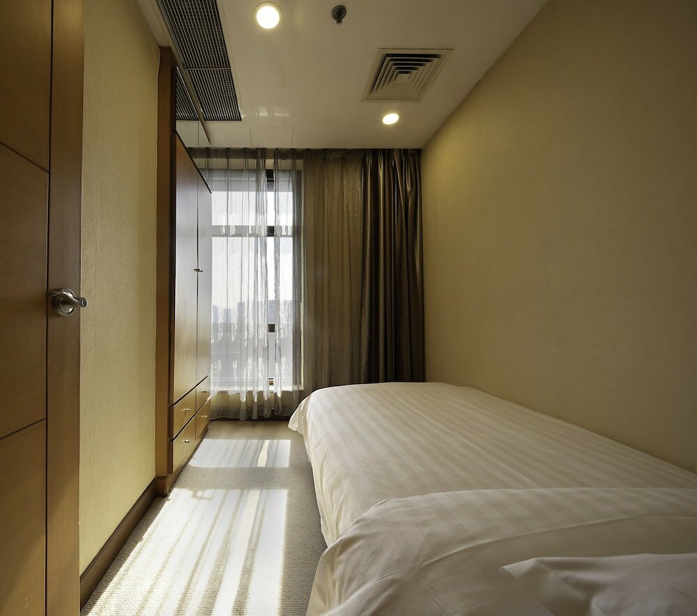 Фото Dalian Asia Pacific Service Apartment