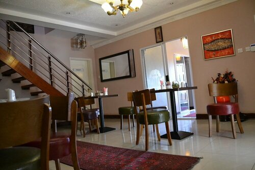 Гостиница Triple Palms Bed and Breakfast в Габороне