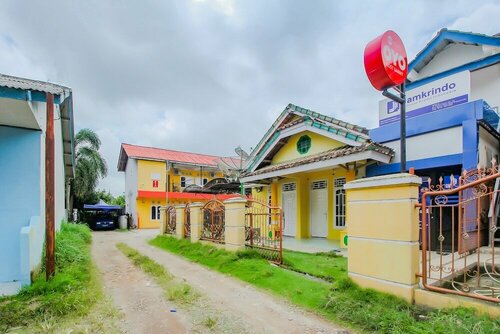 Гостиница Oyo 90216 Kost Sanny в Провинции Южная Суматра