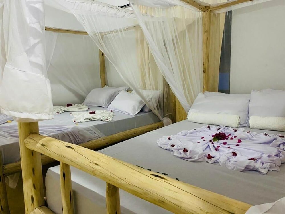 Фото Mkeka Spice Lodge