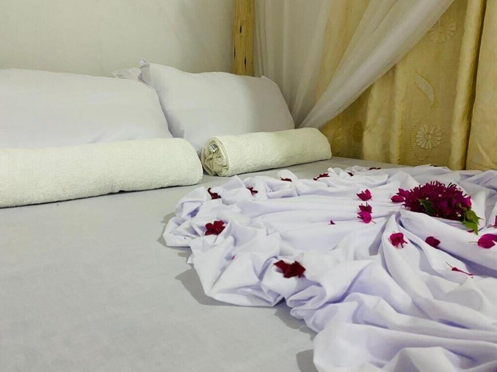 Фото Mkeka Spice Lodge