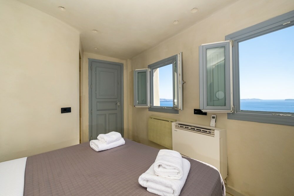 Фото SantorOia Luxury Suites