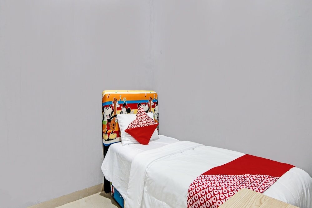 Фото Oyo 92211 Timur Raya Homestay Syariah