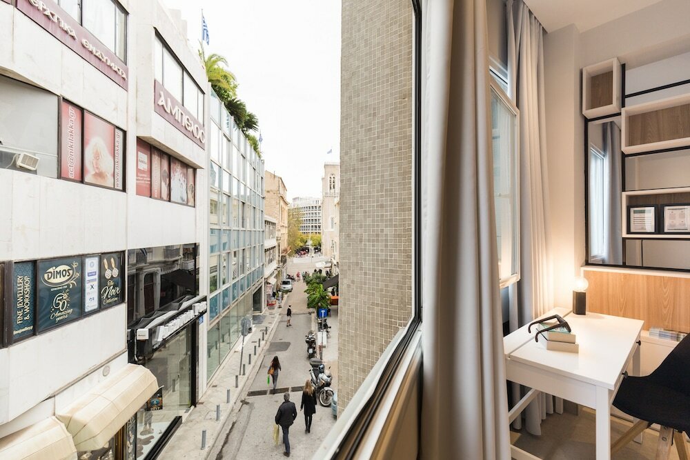 Фото Rastoni Athens Suites nearAcropolis at Tsatsou Street