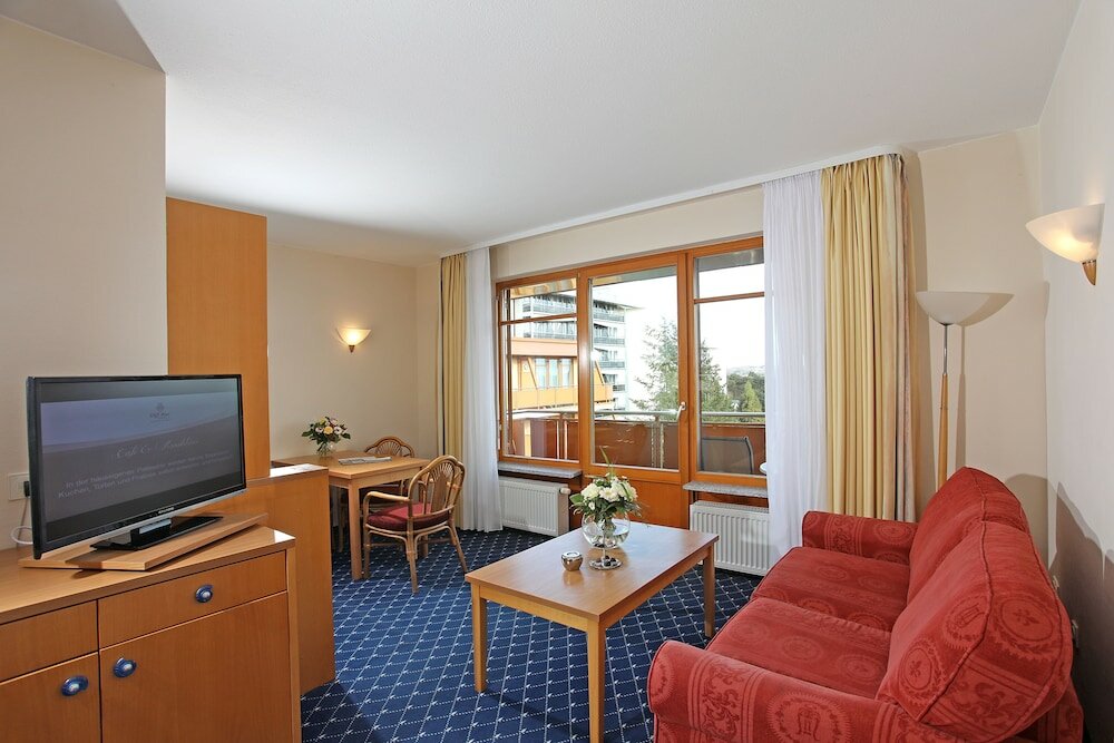 Фото Cliff Wellness Ferienwohnungen Ruegen